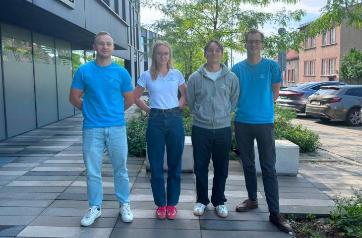 A group photo of the project team: Julia Gonet, Julian Konopka, Bruno Pańpuch, Kacper Burek